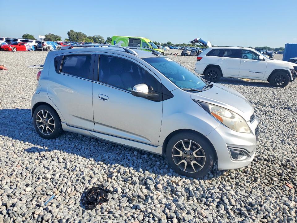 2014 Chevrolet VIN KL8CF6S93EC500548 COPART salvage auction — NORMAL WEAR, Fl - Certificate Of Title, sold $1,475 on 2026-07-10 (photo 4)