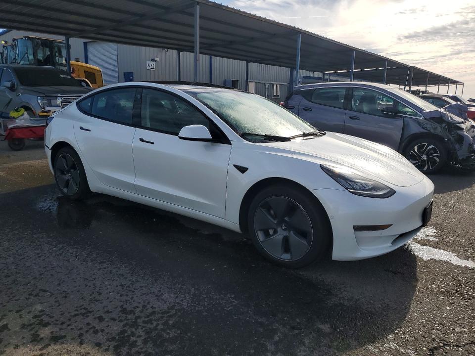2022 Tesla Model 3 VIN 5YJ3E1EB0NF259546 COPART salvage auction — REAR END, CA - SALVAGE CERTIFICATE, sold $9,200 on 2026-07-13 (photo 4)