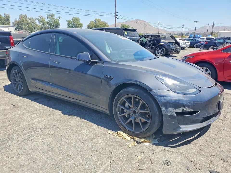 2023 Tesla Model 3 VIN 5YJ3E1EAXPF616161 COPART salvage auction — FRONT END, IN - CERT OF TITLE-SALVAGE TITLE, sold $5,300 on 2026-07-16 (photo 4)