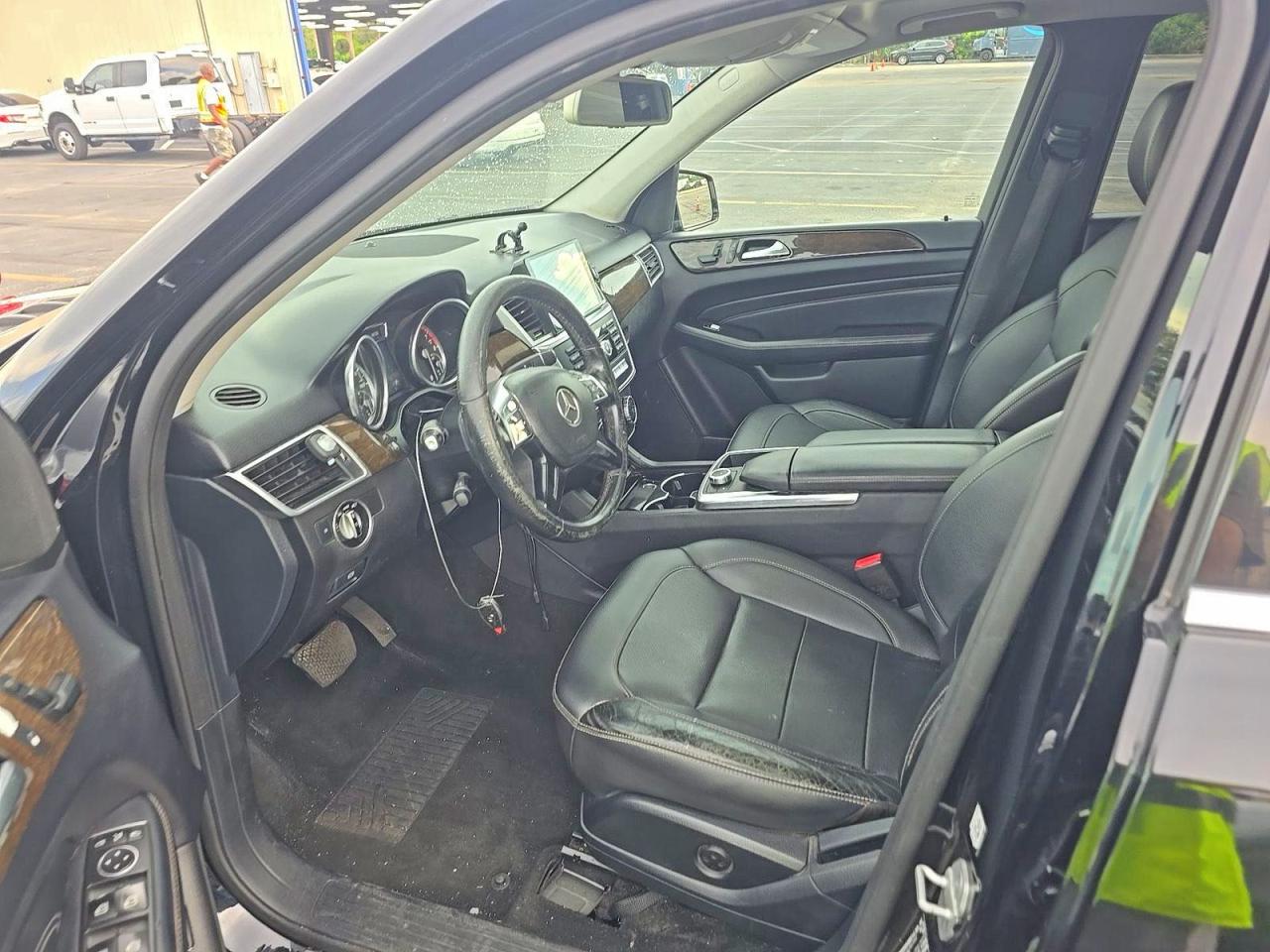 2015 Mercedes-Benz ML-Class VIN 4JGDA5JB7FA557255 COPART salvage auction — Minor Dent/Scratches, FL - CERTIFICATE OF TITLE (P), sold $600 on 2026-07-01 (photo 5)