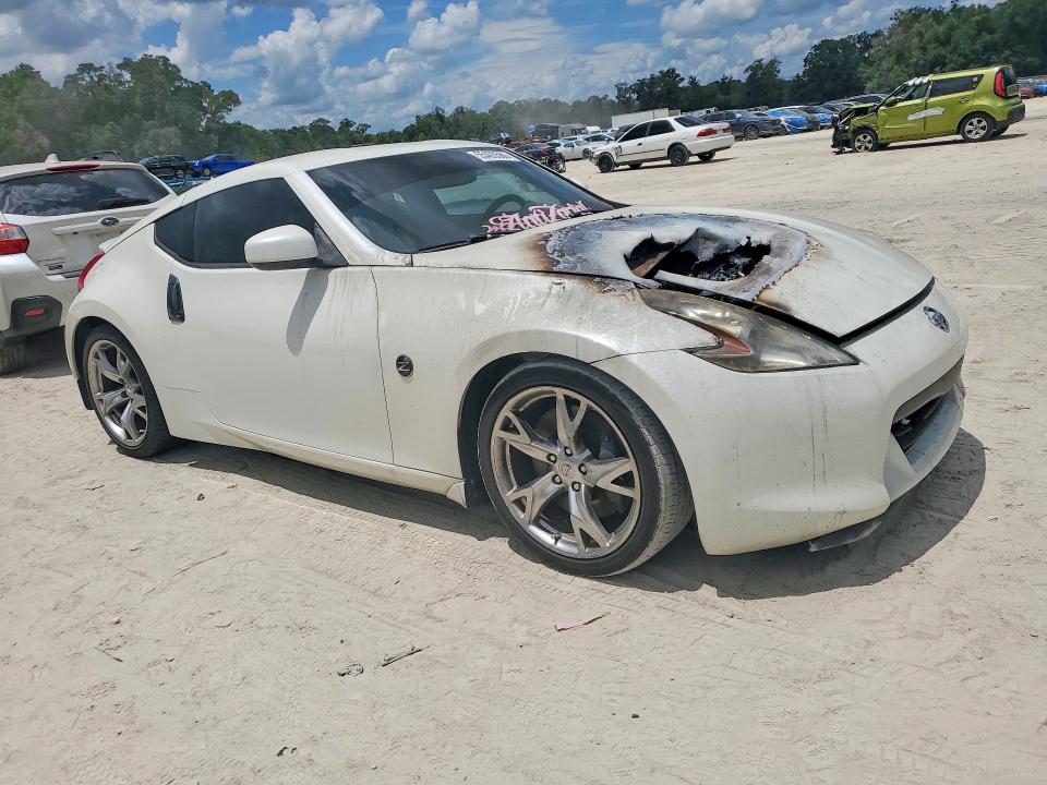 2010 Nissan 370z VIN JN1AZ4EH8AM506852 COPART salvage auction — ENGINE BURN, Fl - Cert Of Title Slvg Rebuildable, sold $725 on 2026-07-28 (photo 4)