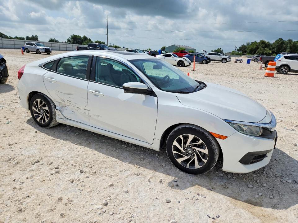 2016 Honda VIN 19XFC2F7XGE002115 COPART salvage auction — SIDE, Tx - Salvage Vehicle Title, sold $90 on 2026-07-09 (photo 4)