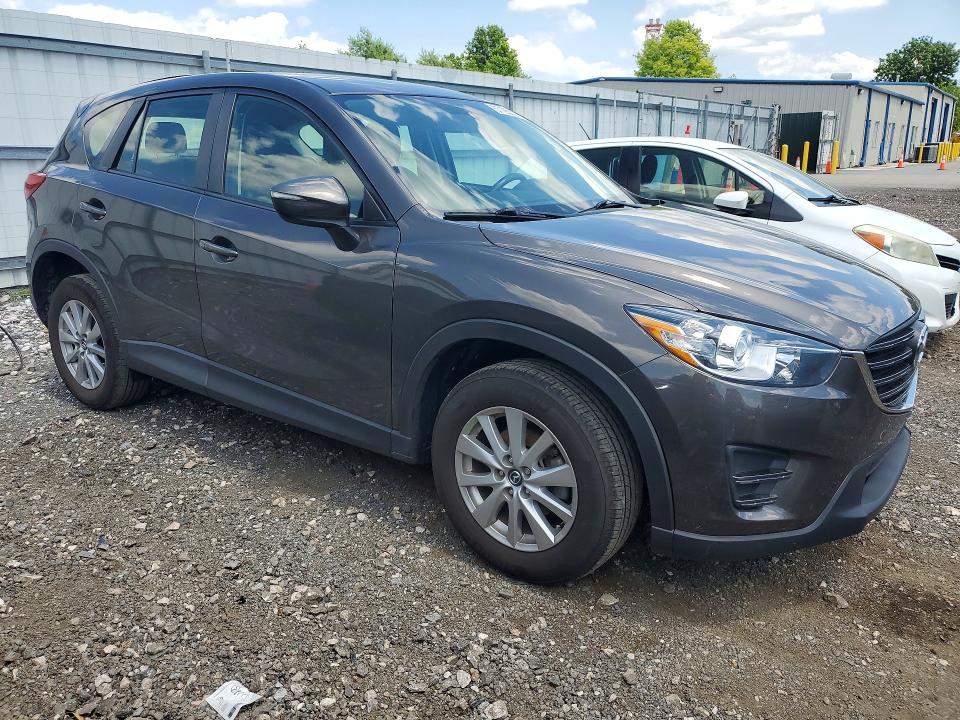 2016 Mazda VIN JM3KE4BY1G0751680 COPART salvage auction — SIDE, Md - Cert Of Salvage > 75% Damage, sold $2,000 on 2026-07-27 (photo 4)