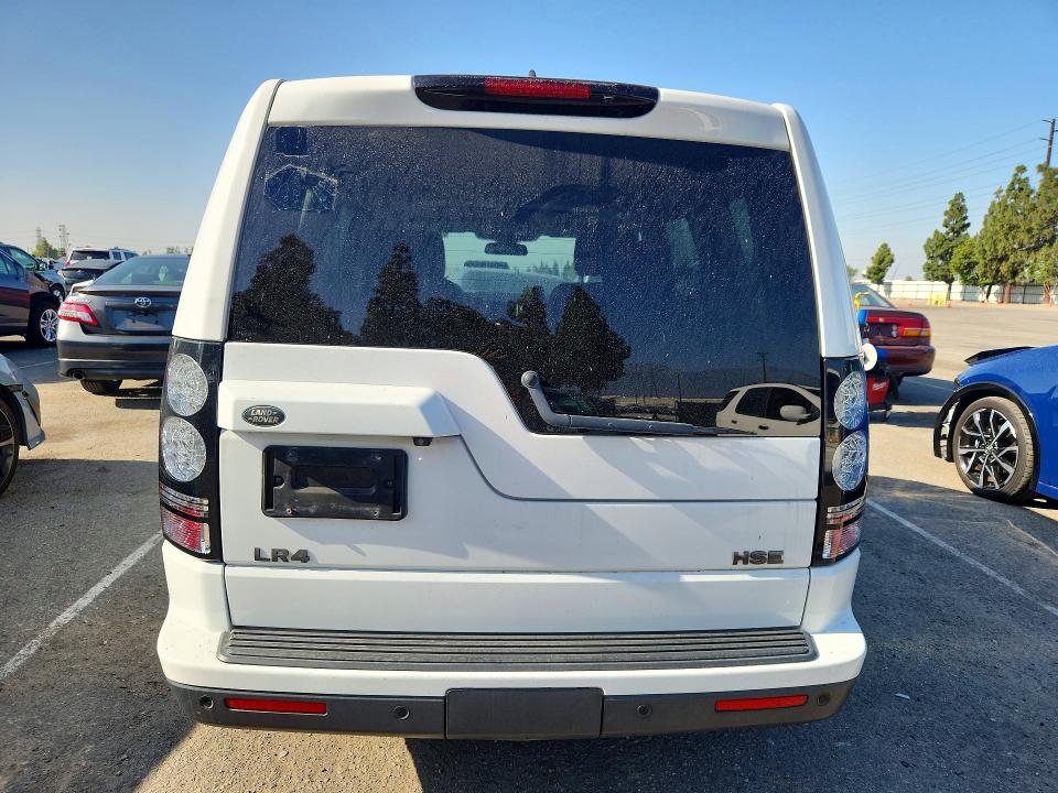 2015 Land rover VIN SALAG2V64FA774613 COPART salvage auction — NORMAL WEAR, In - Dis/Dlr/Exp Only Clean Title (P), sold $2,400 on 2026-07-28 (photo 6)