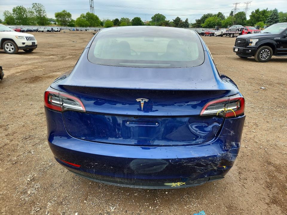2023 Tesla Model 3 VIN 5YJ3E1EA7PF680318 COPART salvage auction — REAR END, Il - Salvage Certificate, sold $8,700 on 2026-07-07 (photo 6)