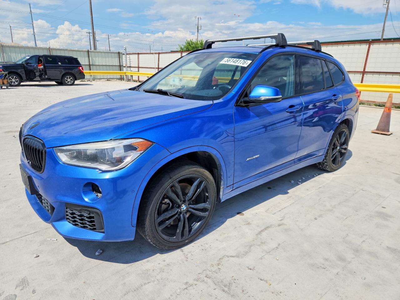2017 BMW X1 VIN WBXHT3C37H5F80031 — COPART salvage auction photo