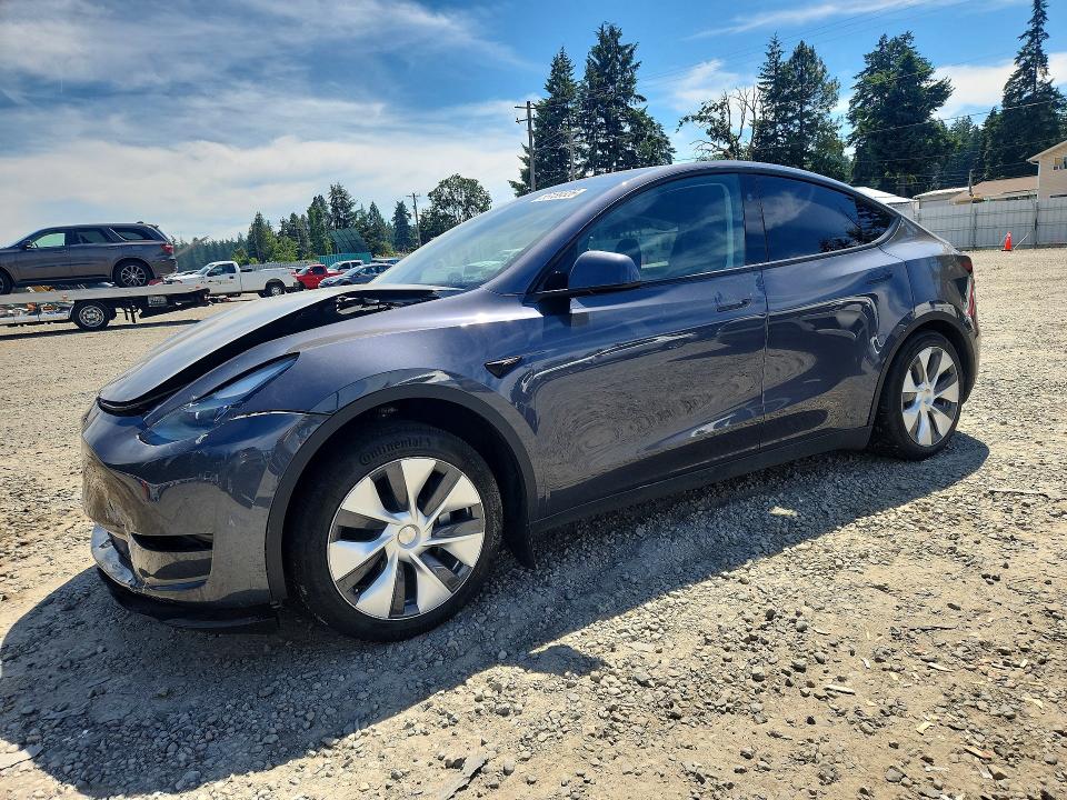 2023 Tesla Model y VIN 7SAYGAEE6PF945252 — COPART salvage auction photo