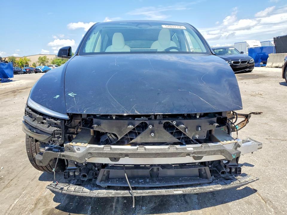 2026 Tesla Model y VIN 7SAYGDED9TF381583 COPART salvage auction — FRONT END, Fl - Certificate Of Destruction, sold $1,100 on 2026-07-30 (photo 5)