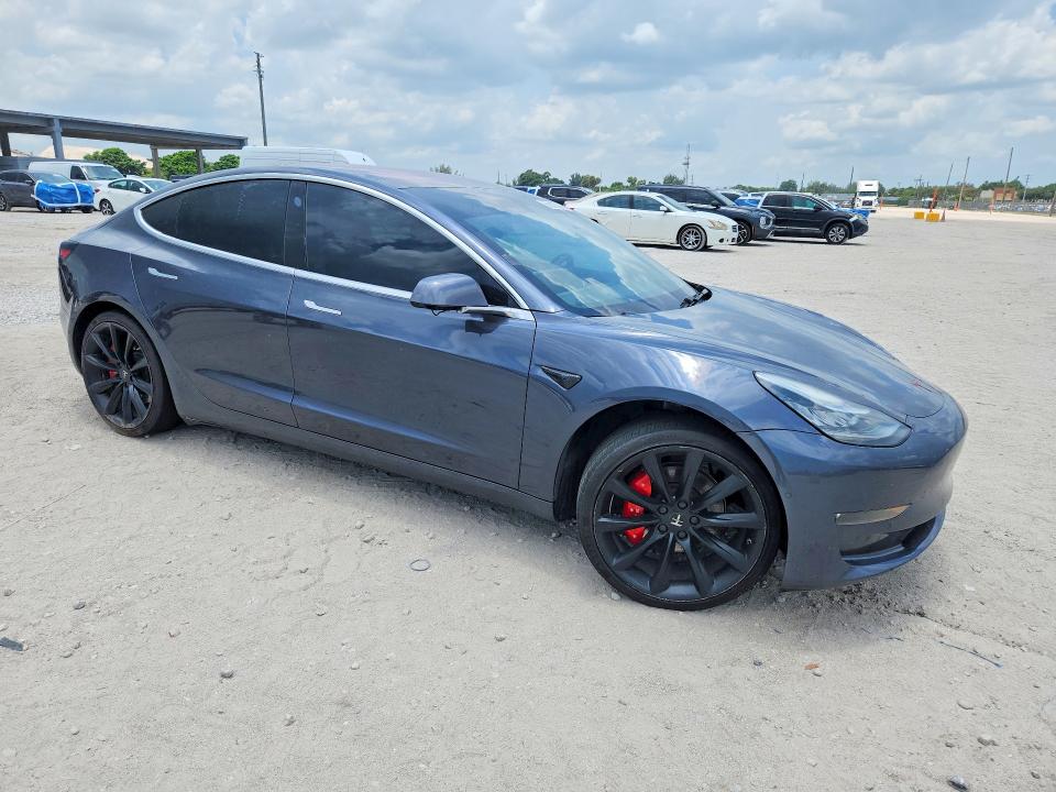 2018 Tesla Model 3 VIN 5YJ3E1EA1JF009525 COPART salvage auction — MINOR DENT/SCRATCHES, Fl - Certificate Of Title, sold $6,200 on 2026-07-07 (photo 4)