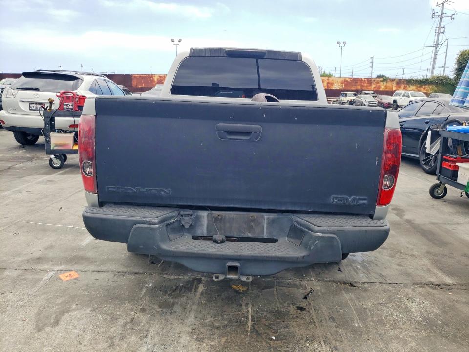 2012 Gmc Canyon VIN 1GTD5MFE4C8135131 COPART salvage auction — NORMAL WEAR, Ca - Dis/Dlr/Exp Only Clean Title, sold $900 on 2026-07-08 (photo 6)