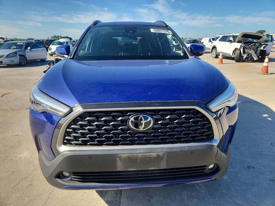 2022 Toyota Corolla cross VIN 7MUDAABG9NV024743 COPART salvage auction — WATER/FLOOD, TX - SALVAGE TITLE-FLOOD DAMAGE, sold $6,500 on 2026-07-03 (photo 5)