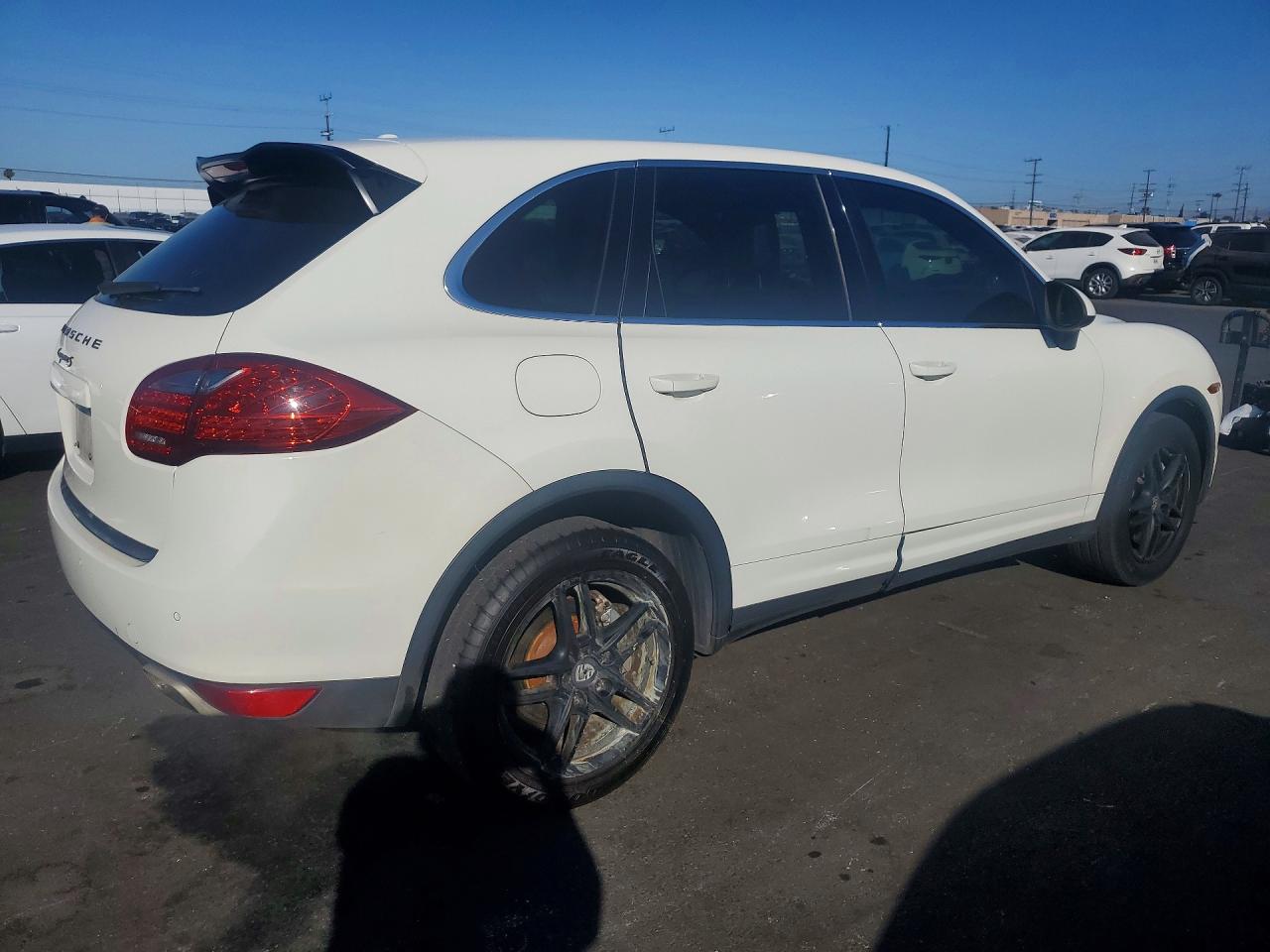 2011 Porsche Cayenne VIN WP1AB2A25BLA42058 COPART salvage auction — Side, FL - DIS/DLR/EXP ONLY CLEAN TITLE, sold $1,150 on 2026-07-08 (photo 3)