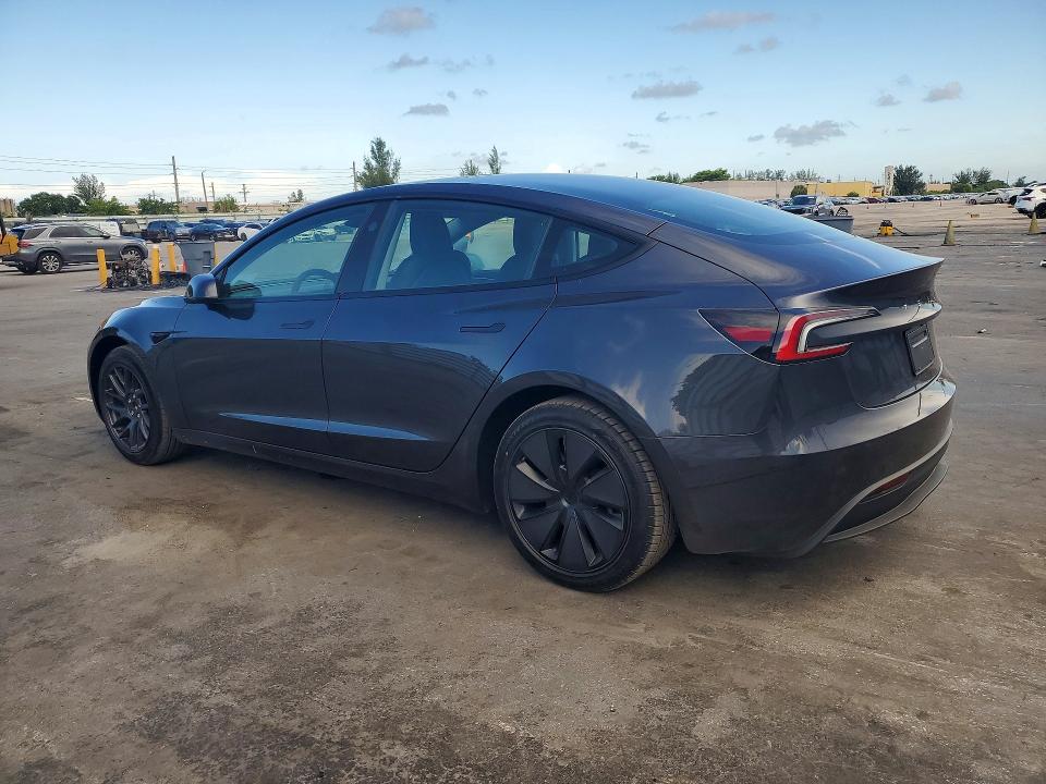2024 Tesla Model 3 VIN 5YJ3E1EA7RF849613 COPART salvage auction — DAMAGE HISTORY, Fl - Cert Of Title Slvg Rebuildable (P), sold $12,600 on 2026-07-20 (photo 2)