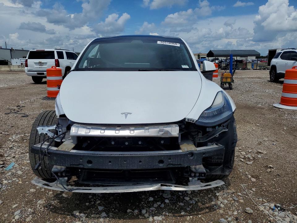 2022 Tesla VIN 7SAYGDEE9NF436190 COPART salvage auction — SIDE, Tx - Salvage Vehicle Title, sold $8,900 on 2026-07-27 (photo 5)