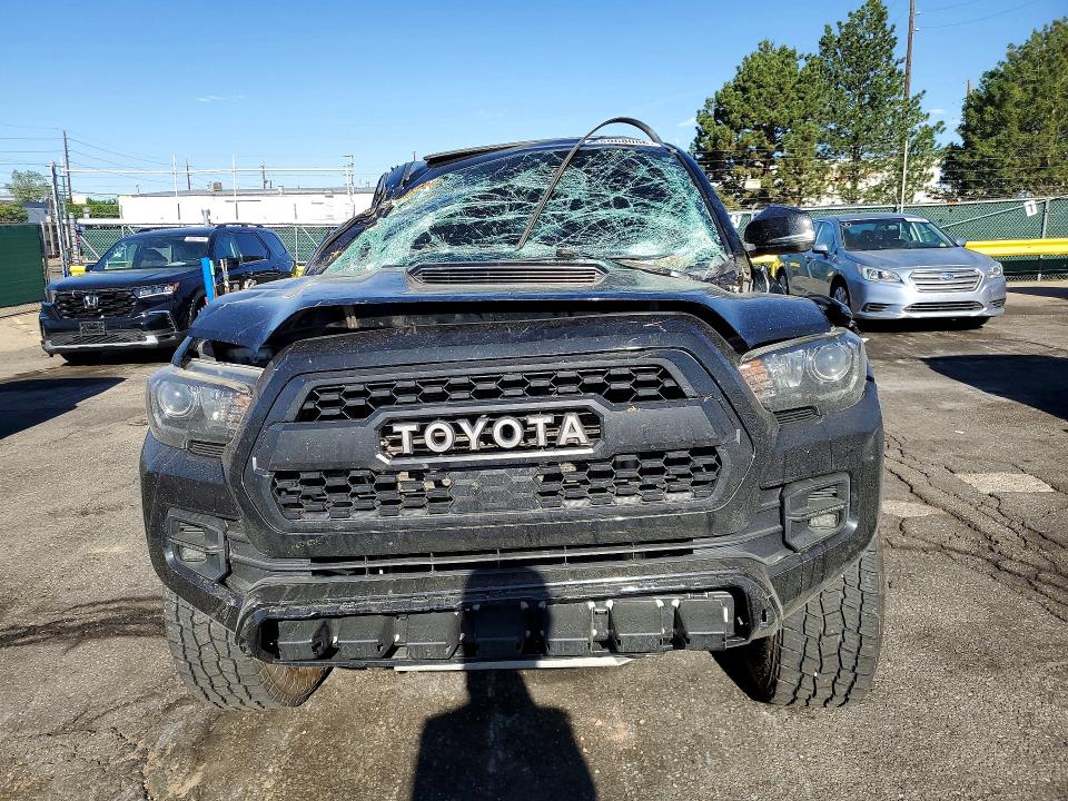 2019 Toyota Tacoma VIN 5TFCZ5AN7KX209708 COPART salvage auction — ROLLOVER, Co - Public - Salvage Title, sold $9,000 on 2026-07-09 (photo 5)