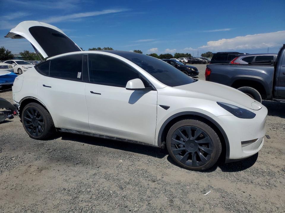 2023 Tesla Model y VIN 7SAYGDEE8PF690878 COPART salvage auction — REAR END, CA - SALVAGE CERTIFICATE, sold $10,700 on 2026-07-28 (photo 4)