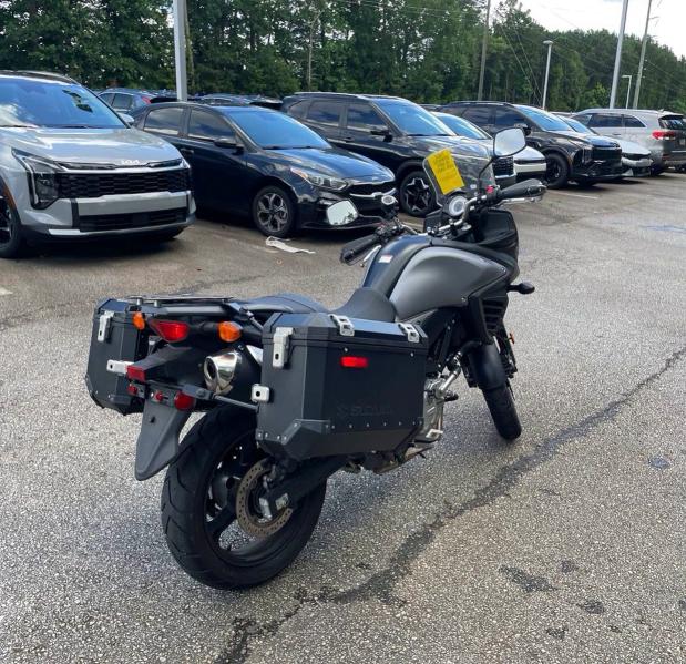 2015 Suzuki VIN JS1VP56A9F2102113 COPART salvage auction — NORMAL WEAR, Ga - Certificate Of Title (P), sold $2,950 on 2026-07-28 (photo 4)