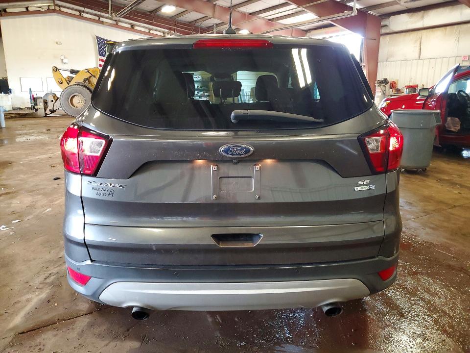 2019 Ford Escape VIN 1FMCU9GDXKUC06822 COPART salvage auction — MINOR DENT/SCRATCHES, Mi - Certificate Of Title, sold $1,550 on 2026-07-02 (photo 6)