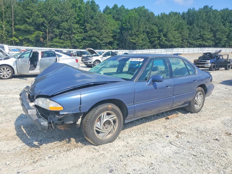 1995 Pontiac Bonneville VIN 1G2HX52KXS4287972 — COPART salvage auction photo