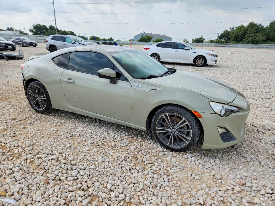 2016 Scion VIN JF1ZNAA1XG9706121 COPART salvage auction — REAR END, TX - SALVAGE VEHICLE TITLE (P), sold $1,200 on 2026-07-16 (photo 4)