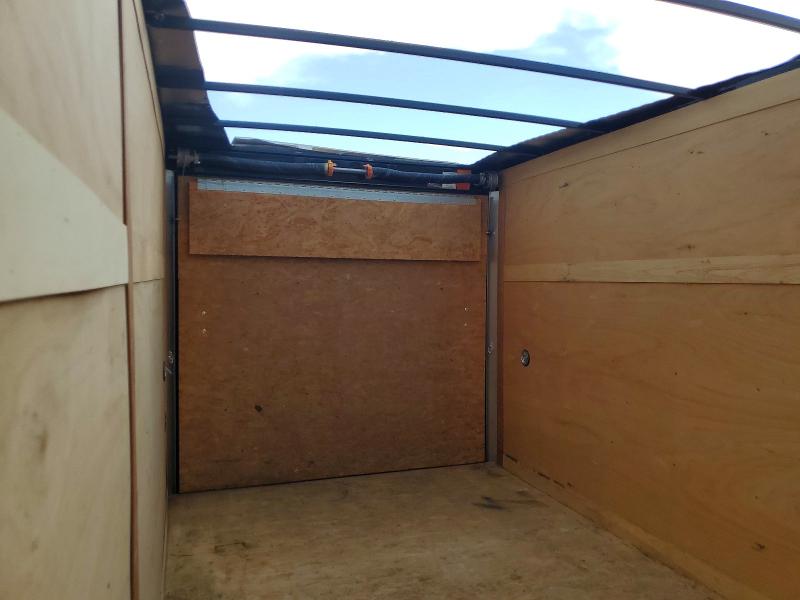2021 Wells Cargo VIN 7KC1E1629MT000585 COPART salvage auction — WATER/FLOOD, TX - SALVAGE TITLE-FLOOD DAMAGE, sold $150 on 2026-07-30 (photo 6)