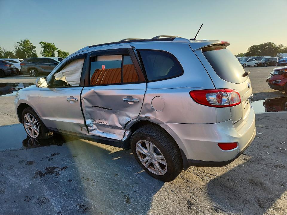 2012 Hyundai Santa fe VIN 5XYZK3ABXCG128084 COPART salvage auction — SIDE, Fl - Cert Of Title Slvg Rebuildable, sold $1,150 on 2026-07-16 (photo 2)
