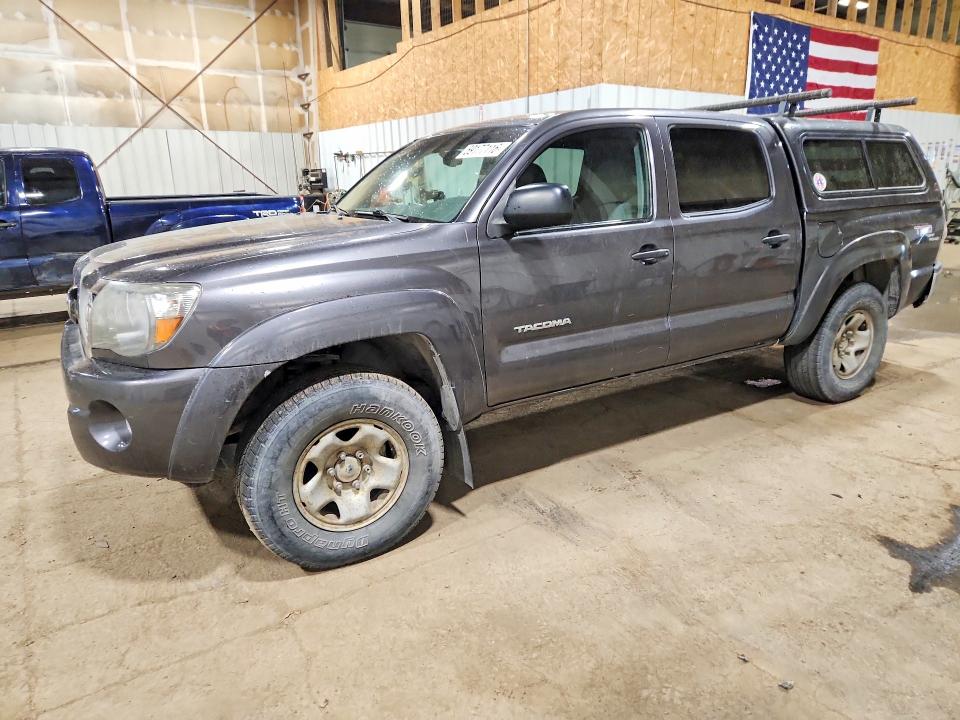 2011 Toyota Tacoma VIN 5TFLU4EN0BX020076 — COPART salvage auction photo