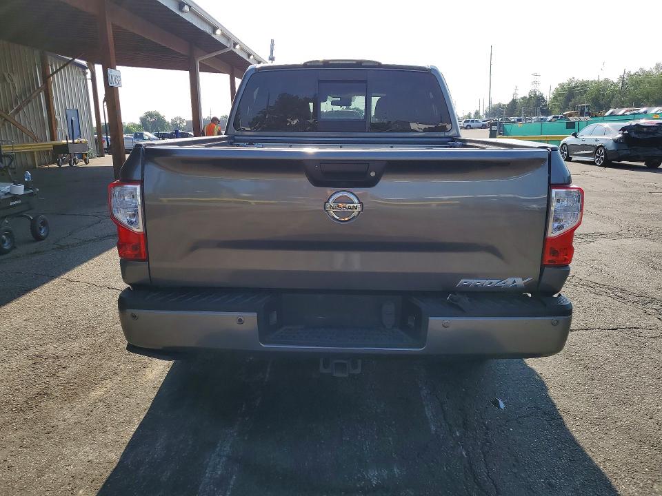 2018 Nissan VIN 1N6AA1E55JN538979 COPART salvage auction — SIDE, Co - Public - Salvage Title, sold $6,300 on 2026-07-28 (photo 6)