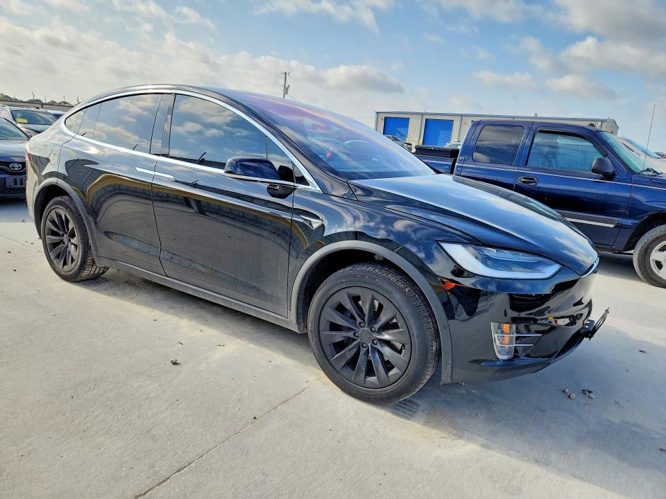 2017 Tesla VIN 5YJXCBE27HF051309 COPART salvage auction — REAR END, Tx - Certificate Of Title, sold $9,000 on 2026-07-31 (photo 4)