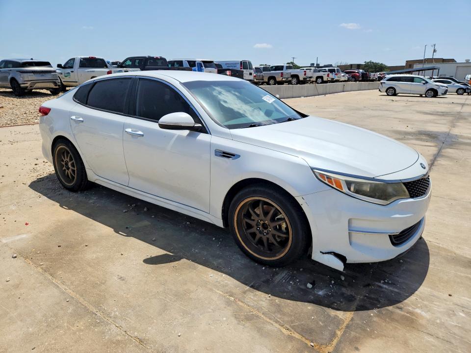 2018 Kia Optima VIN 5XXGT4L35JG197976 COPART salvage auction — WATER/FLOOD, Tx - Salvage Title-Flood Damage, sold $550 on 2026-07-20 (photo 4)