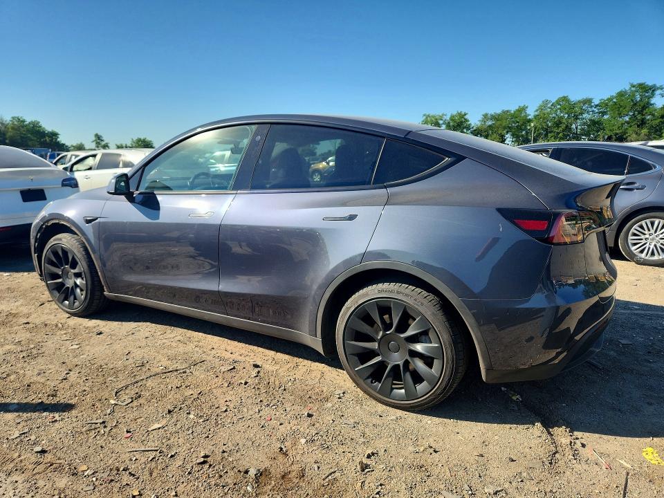 2023 Tesla Model y VIN 7SAYGDEE9PA034654 COPART salvage auction — SIDE, MD - CERT OF SALVAGE < 75% DAMAGE, sold $11,600 on 2026-07-07 (photo 2)