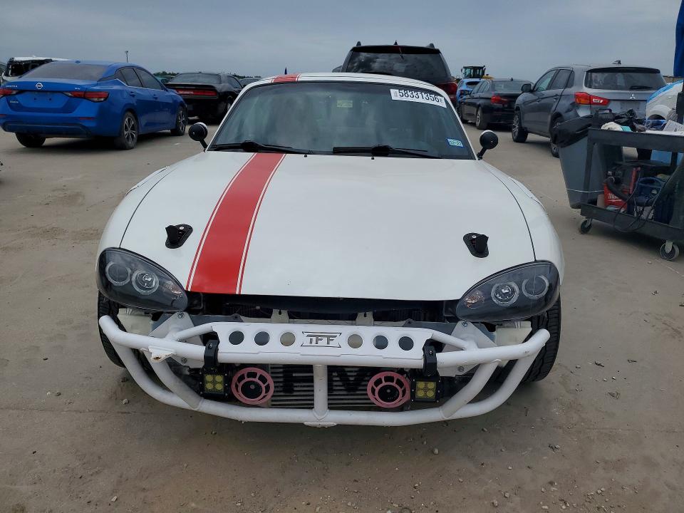 1999 Mazda Mx-5 VIN JM1NB3538X0100989 COPART salvage auction — WATER/FLOOD, Tx - Salvage Title-Flood Damage, sold $5,300 on 2026-07-23 (photo 5)