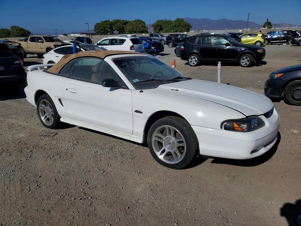 1997 Ford Mustang VIN 1FALP45X0VF153588 COPART salvage auction — MINOR DENT/SCRATCHES, Fl - Cert Of Title-Rebuildable Slvg, sold $475 on 2026-07-02 (photo 4)