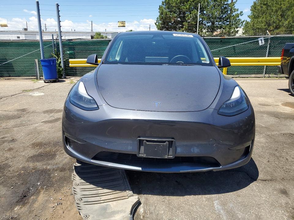 2023 Tesla Model y VIN 7SAYGAEE4PF595636 COPART salvage auction — FRONT END, Co - Public - Salvage Title, sold $300 on 2026-07-30 (photo 5)