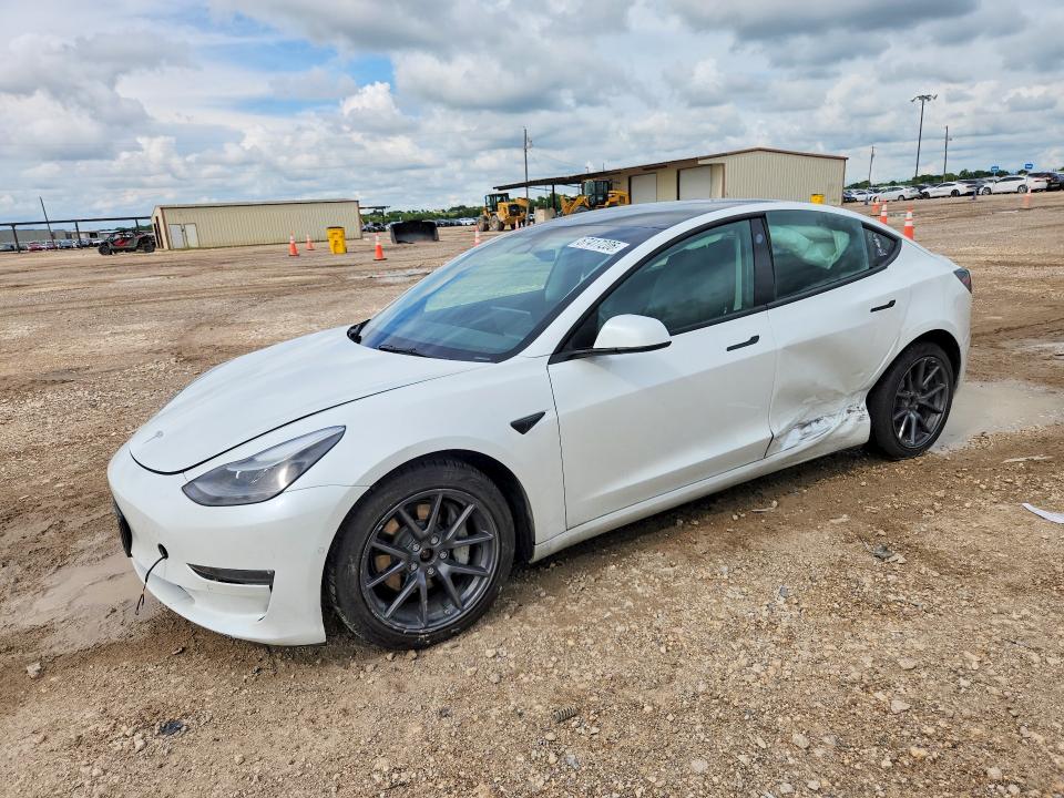 2022 Tesla Model 3 VIN 5YJ3E1EB1NF196263 COPART salvage auction — SIDE, TX - SALVAGE VEHICLE TITLE (P), sold $6,000 on 2026-07-29 (photo 1)