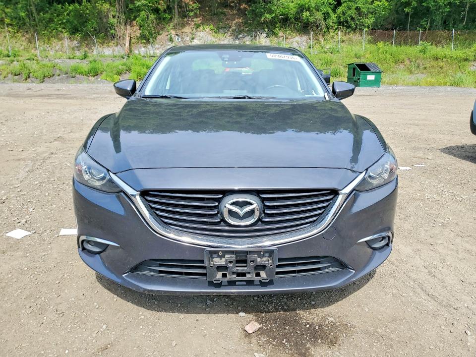 2016 Mazda VIN JM1GJ1T50G1450129 COPART salvage auction — MECHANICAL, Fl - Certificate Of Title, sold $350 on 2026-07-28 (photo 5)