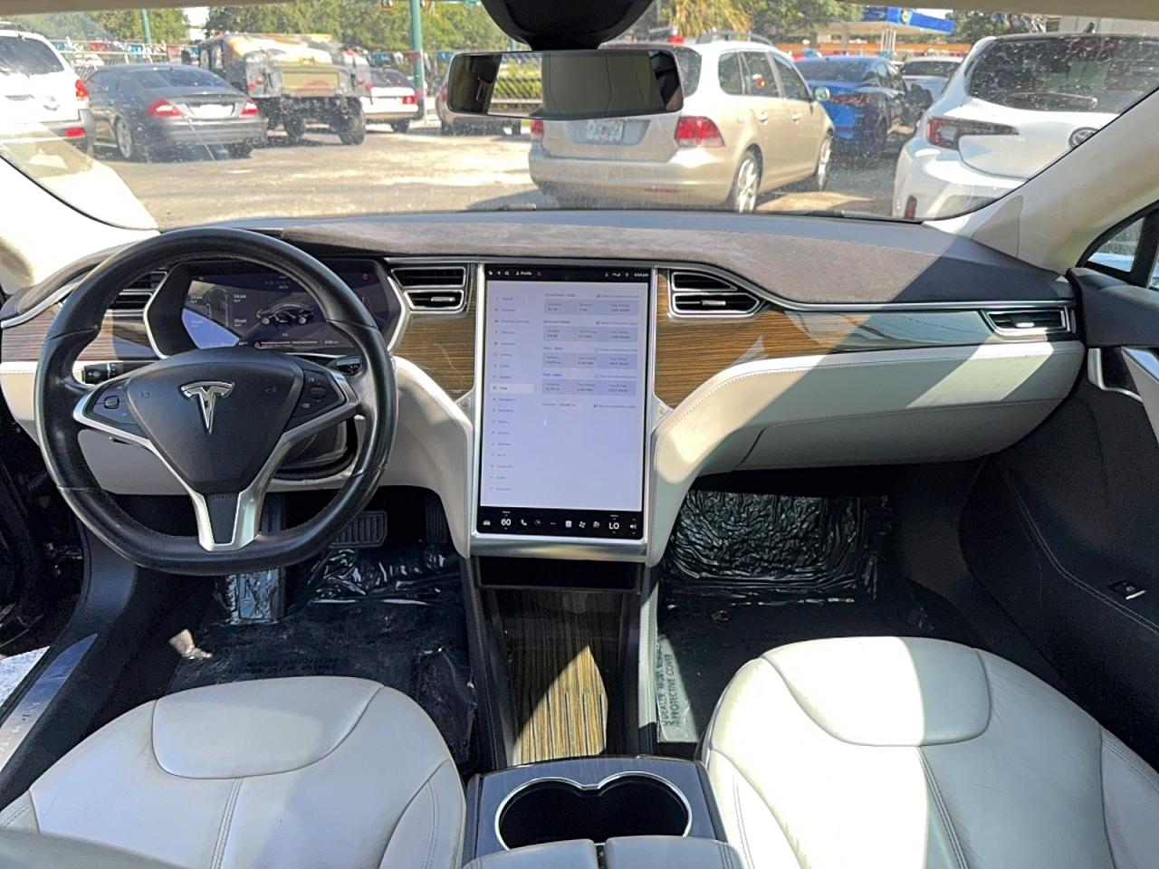 2014 Tesla Model S VIN 5YJSA1H1XEFP66125 COPART salvage auction — Normal Wear, FL - CERTIFICATE OF TITLE (P), sold $3,200 on 2026-07-01 (photo 9)