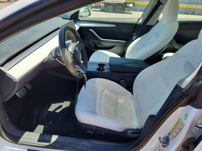 2023 Tesla Model 3 VIN 5YJ3E1EA6PF552040 COPART salvage auction — SIDE, Salvage Title, sold $9,600 on 2026-08-28 (photo 7)