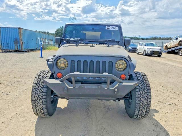 2009 Jeep Wrangler unlimited VIN 1J4GA39129L752913 COPART salvage auction — SIDE, CA - SALVAGE CERTIFICATE, sold $6,600 on 2026-07-02 (photo 5)