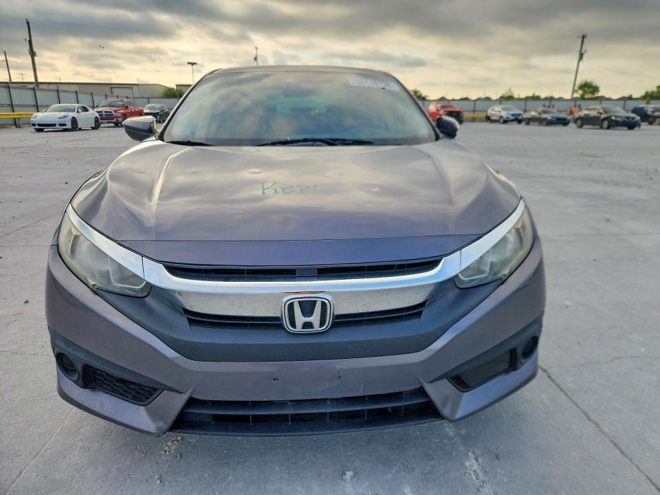 2018 Honda Civic VIN 19XFC2F67JE039704 COPART salvage auction — HAIL, Tx - Certificate Of Title, sold $9,000 on 2026-08-25 (photo 5)