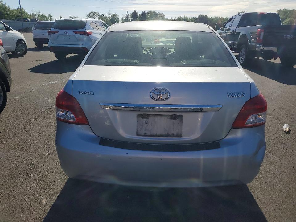 2010 Toyota Yaris VIN JTDBT4K36A1360982 COPART salvage auction — FRONT END, Or - Salvage Title Certificate, sold $125 on 2026-07-29 (photo 6)