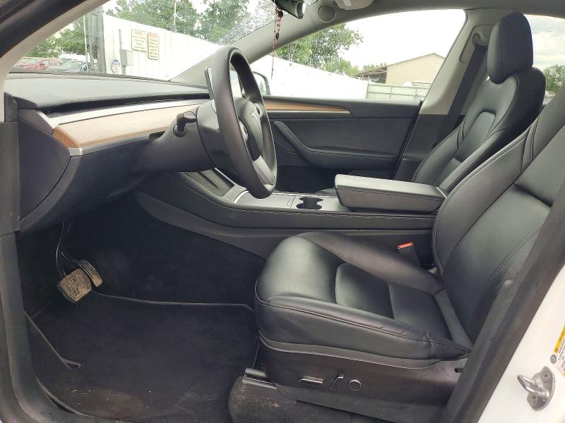 2023 Tesla Model y VIN 7SAYGDEE1PF611177 COPART salvage auction — REAR END, Ny - Cert Of Title-Rebuilt Salvage, sold $14,300 on 2026-07-06 (photo 7)