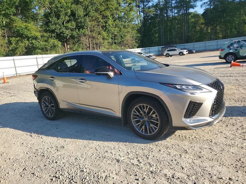2021 Lexus Rx VIN 2T2YGMDA7MC062463 COPART salvage auction — REAR END, Nc - Salvage Certificate Of Title, sold $27,000 on 2026-08-07 (photo 4)