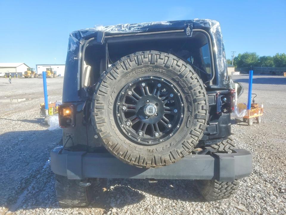 2014 Jeep Wrangler unlimited VIN 1C4BJWEG0EL135452 COPART salvage auction — ALL OVER, Tn - Salvage Certificate (P), sold $4,100 on 2026-07-02 (photo 6)