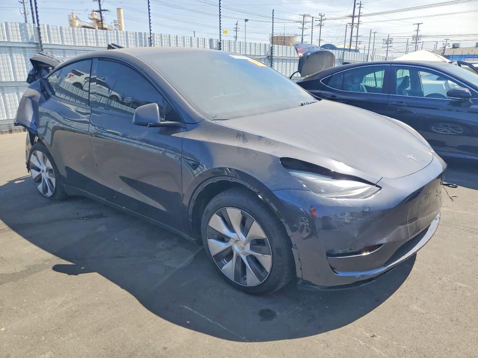 2024 Tesla Model y VIN 7SAYGDEE5RF031434 COPART salvage auction — REAR END, Ca - Salvage Certificate, sold $7,100 on 2026-07-20 (photo 4)