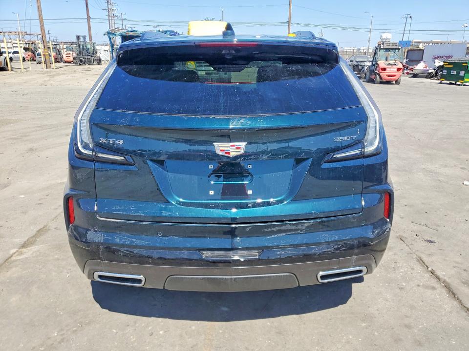 2025 Cadillac Xt4 VIN 1GYFZER46SF159327 COPART salvage auction — SIDE, Az - Dis/Dlr/Exp Only Salvage Title, sold $10,500 on 2026-07-29 (photo 6)