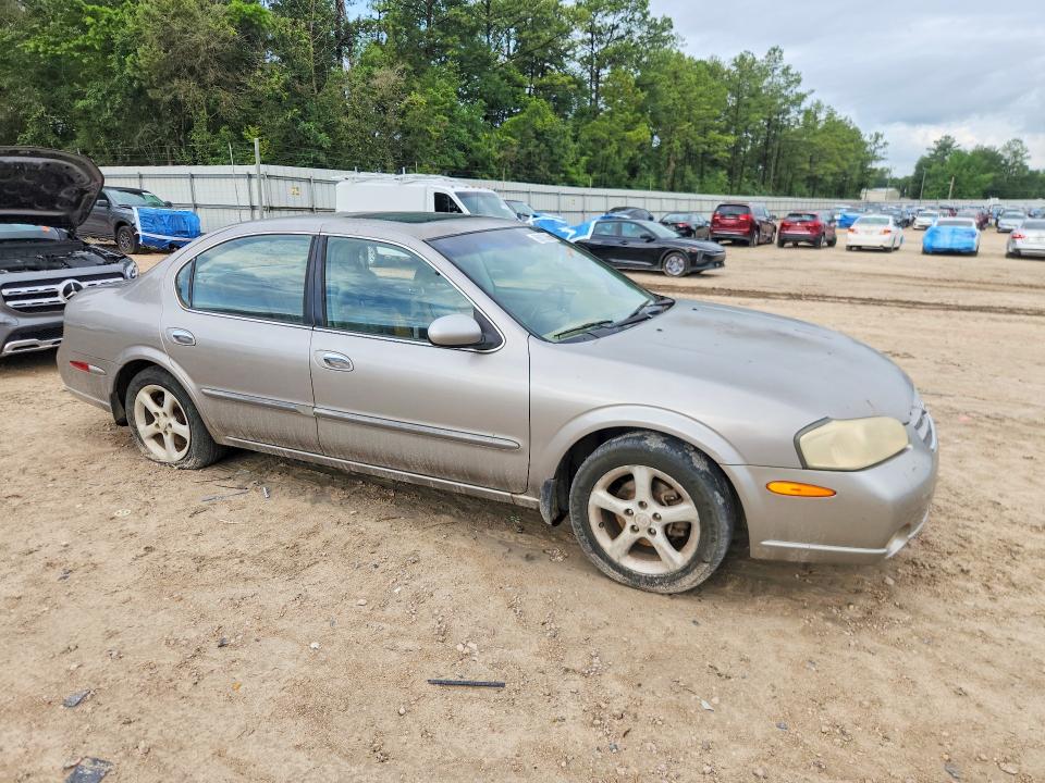 2001 Nissan Maxima VIN JN1CA31D61T818770 COPART salvage auction — SIDE, Fl - Cert Of Title Slvg Rebuildable, sold $300 on 2026-07-17 (photo 4)