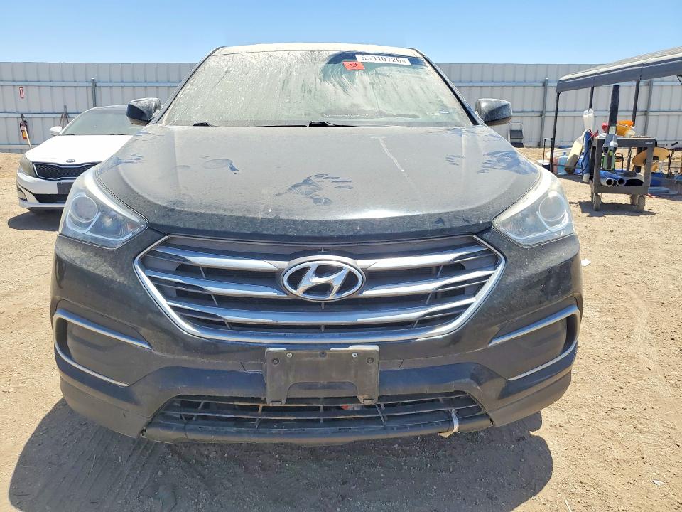 2018 Hyundai Santa fe VIN 5XYZT3LB8JG568733 COPART salvage auction — INTERIOR BURN, Ca - Dis/Dlr/Exp Only Clean Title, sold $1,500 on 2026-07-20 (photo 5)