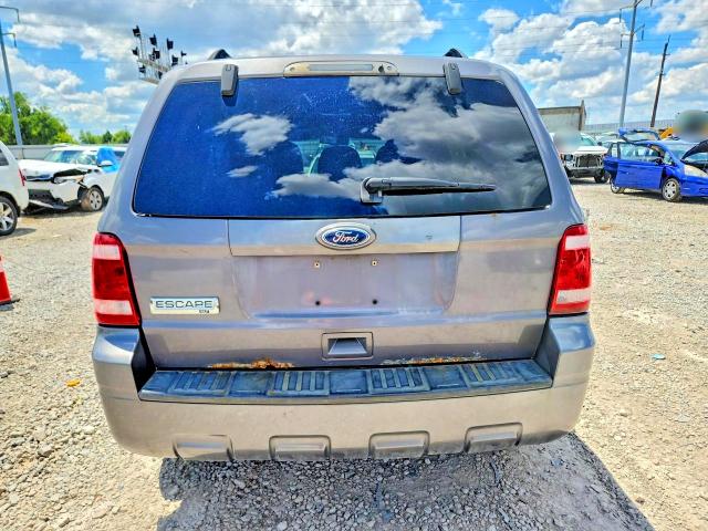 2011 Ford Escape VIN 1FMCU0D73BKA04930 COPART salvage auction — NORMAL WEAR, Oh - Certificate Of Title, sold $775 on 2026-07-09 (photo 6)