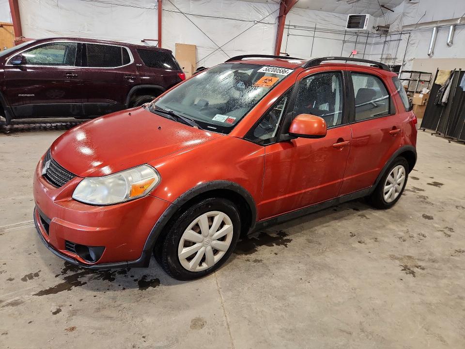 2010 Suzuki Sx4 VIN JS2YB5A33A6300218 COPART salvage auction — MINOR DENT/SCRATCHES, Nc - Parts Only-Record Of Sale, sold $250 on 2026-07-08 (photo 1)